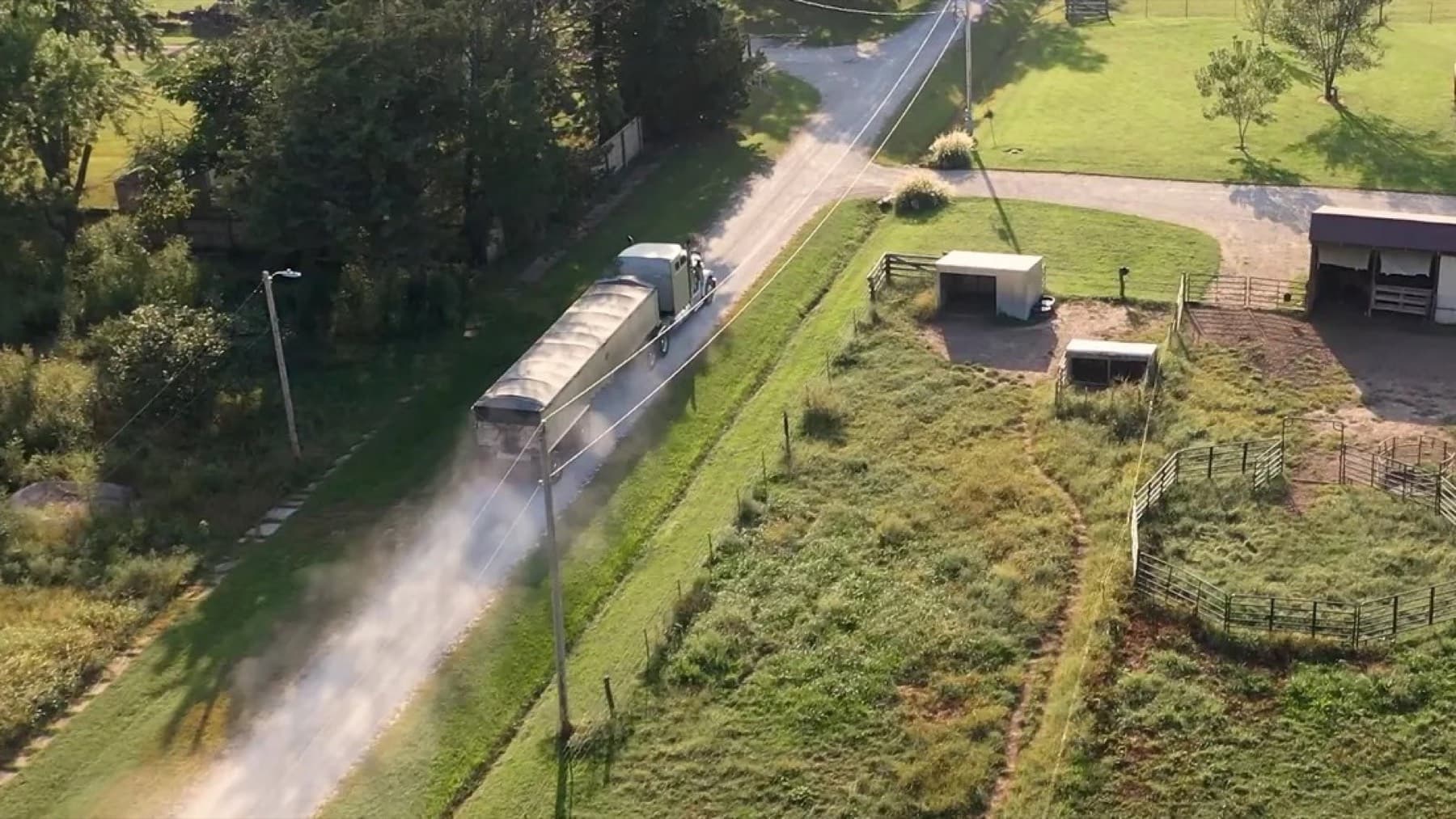 Aerial view of a bulk truck loading at a farm